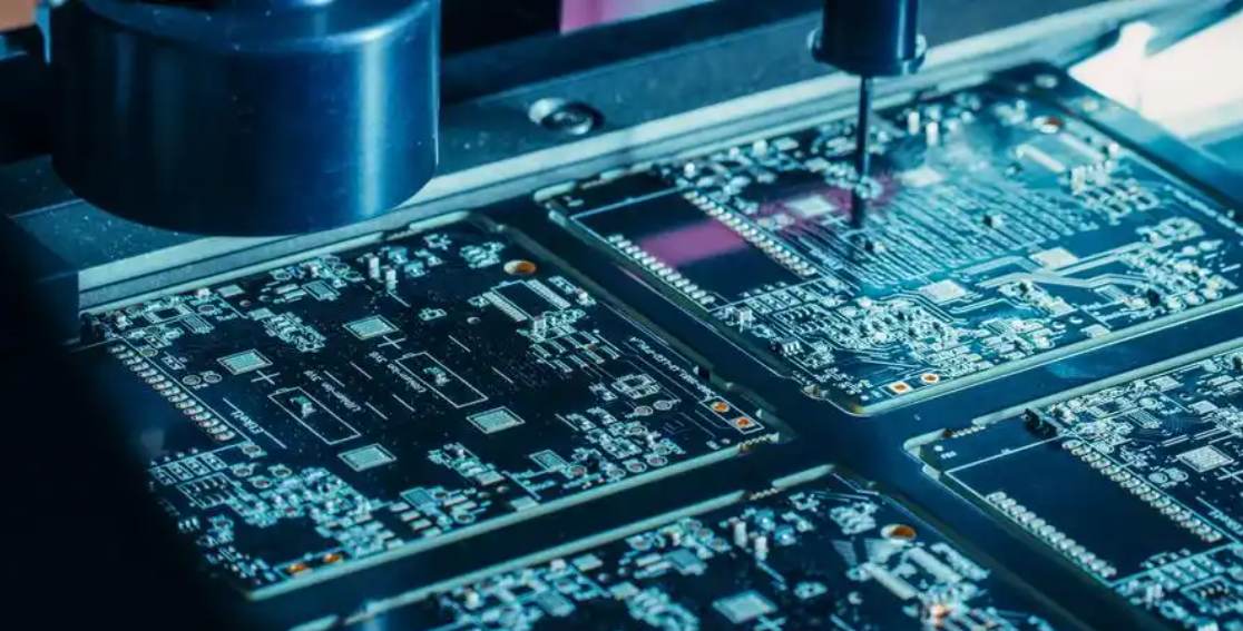 ICT fixture testing a PCB with bed-of-nails probes connected to a test system. ICT fixture testing a PCB with bed-of-nails probes connected to a test system.